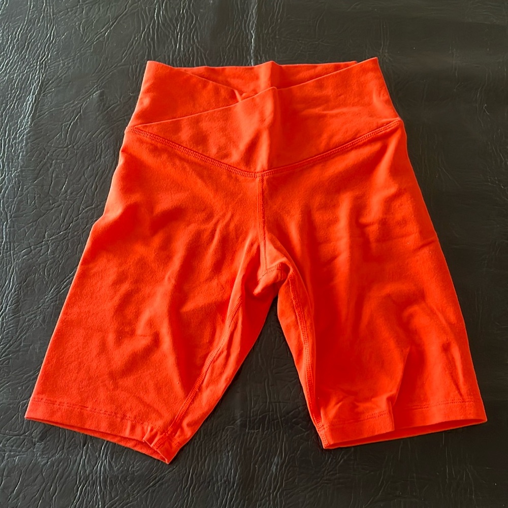 neon orange biker shorts